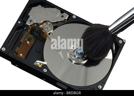 Macro of opened hard disc with cosmetic brush Stock Photo