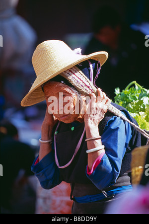Chinese ethnic minority lady in traditional costume, Wase, Yunnan Province, China Stock Photo