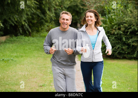 Mature couple jogging Stock Photo