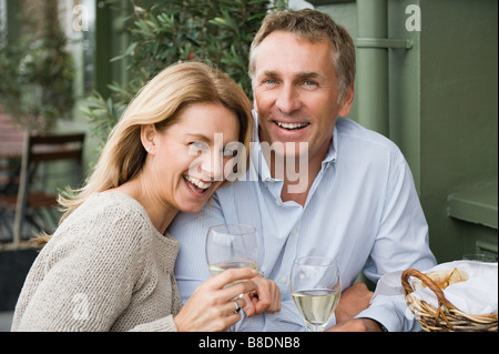 Mature couple drinking wine Stock Photo