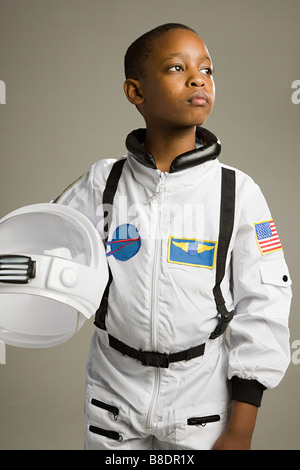 Boy in astronaut costume Stock Photo
