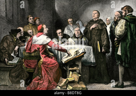 Martin Luther on trial before Cardinal Cajetanus at the Diet of Worms 1521. Hand-colored woodcut Stock Photo