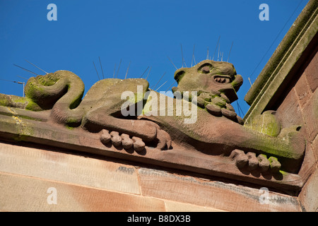 Gargoyle on the roof of St Martin's Church Birmingham City Centre with pigeon spikes Stock Photo