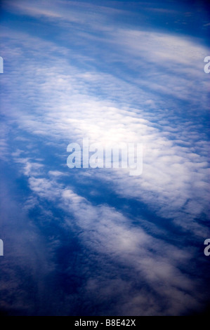 vertical natural background - low cirrus and cumulus clouds in blue sky on  sunny day Stock Photo - Alamy