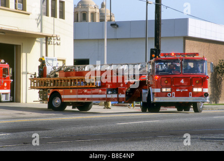 Los Angeles City fire truck backs into station after returning from emergency run. Stock Photo