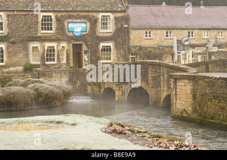 Looking towards to Swan Inn, Bibury over the river Coln Stock Photo