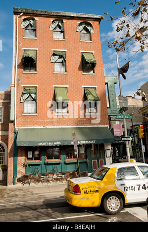 Yellow cab in historic district of Philadelphia Stock Photo