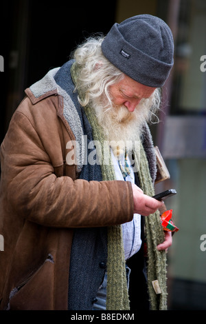 old man with mobile phone Stock Photo