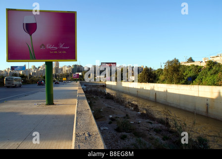billboard is installed at the edge of one beirut river lebanon Stock Photo