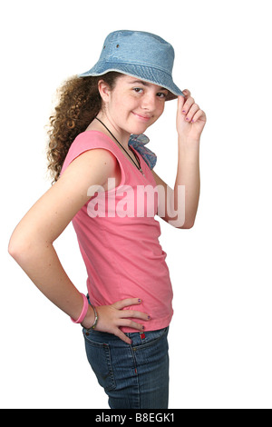 a stylish teenaged girl wearing jeans and a hat isolated Stock Photo