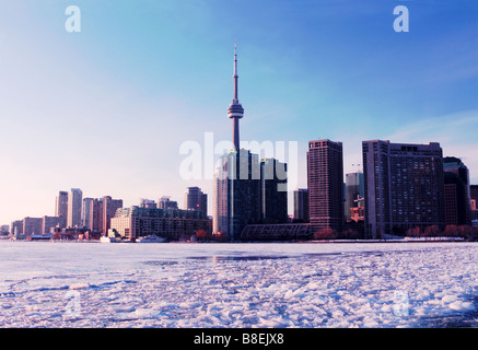 Toronto Harbour and Harbourfront from frozen Lake Ontario at sunset Stock Photo