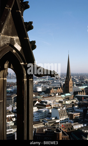 Aerial view of St. Peter's church (Petrikirche) and Gargoyle of St. Nikolai (Nikolaikirche) in the German city of Hamburg. Stock Photo