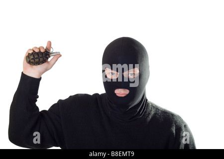 Terrorist in black mask with grenade Isolated on white Stock Photo