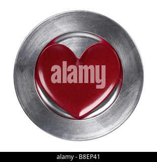 Heart on silver charger plate Stock Photo