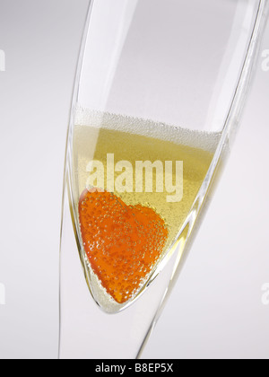 heart in champagne bubbles glass Stock Photo