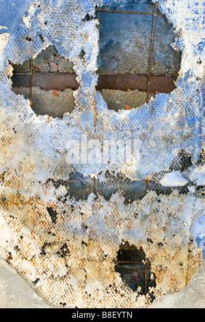 Room ceiling peeling and forming halloween like mask. Stock Photo