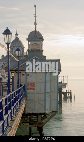 A sign on Eastbourne pier warning of the dangers of diving off the pier Stock Photo