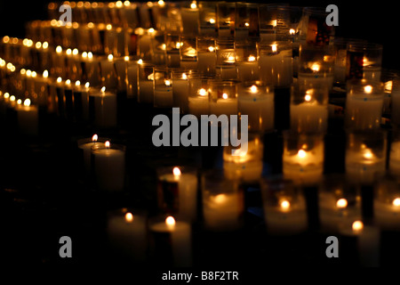 Votive candles in cathedral Stock Photo