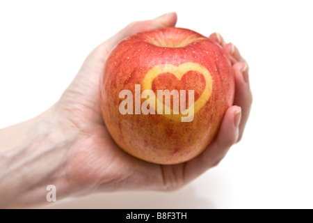 Fuji apple with a heart design on the skin Stock Photo