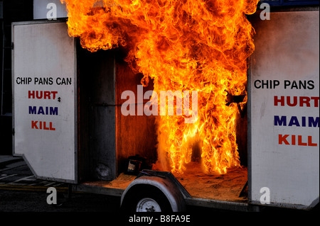 Demonstration of the impact of a chip pan fire Stock Photo
