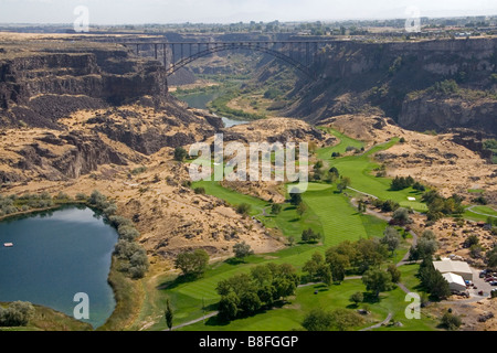 Blue Lakes Country Club golf course and the Perrine Bridge in the Snake River Canyon at Twin Falls Idaho USA Stock Photo