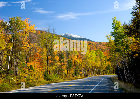 Fall foliage color with snow on Mount Lafayette and the roadways through the White Mountains in New Hampshire USA Stock Photo