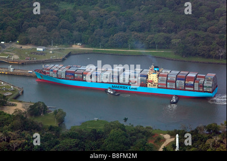 aerial above Maersk container ship entering Pedro Miguel locks Panama Canal Stock Photo