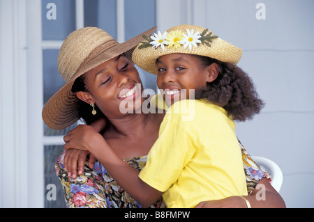 African American mother and daughter portrait on their front porch Stock Photo