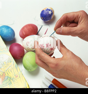 decorating eggs for Easter holiday celebration Stock Photo