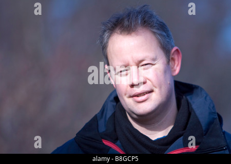 Mature man outside looking at camera Stock Photo