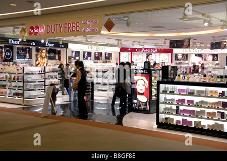 Travelers shop at a duty free store in the Narita International Airport Tokyo Japan Stock Photo