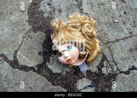 Decapitated dolls head on the street on Saturday February 14 2009 Richard B Levine Stock Photo