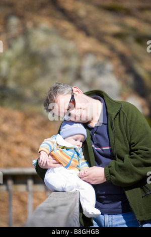Mature father and son outside during autumn Stock Photo
