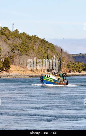 Gillnet fishing boat the Leeanne and Zachary cruising past coastline in 'Cape Cod Canal' Stock Photo