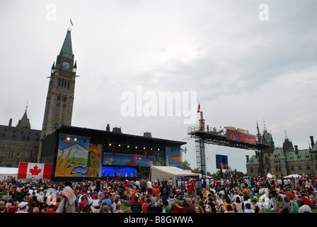 Large crowds gather at Parliament Hill in Ottawa, Ontario to celebrate Canada Day on July 1st 2006. Stock Photo