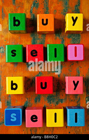 Childrens blocks spelling out buy sell Stock Photo