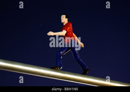 Sculpture called 'Walking Man' by Jonathan Borofsky illuminated by the Full Moon.  Museum of Fine Arts, Boston, MA. Stock Photo