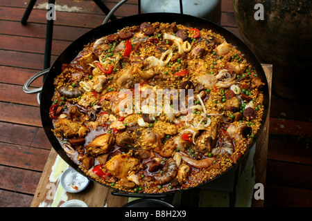 Aborio rice just after being added to a Paella Stock Photo