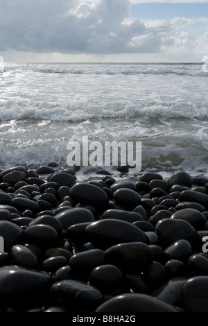 Pebbles and shallow water Stock Photo