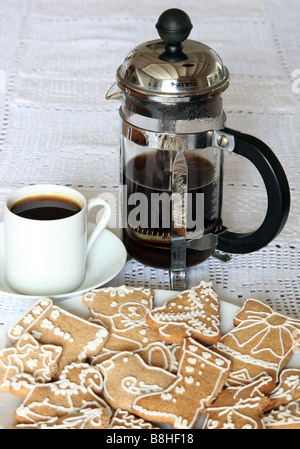 two cup cafetiere and Hungarian ginger biscuits Stock Photo