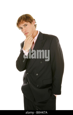 Handsome young businessman lost in thought Isolated on white Stock Photo