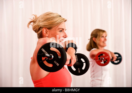 Instructors at FriskisSvettis in Stockholm try out new moves and training programs for areobic, karate and yoga classes Stock Photo