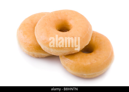 Three doughnuts or donuts piled isolated on white Stock Photo
