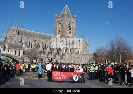 A marching band passes Christ Church Cathedral as they participate in the St Patricks Day Parade in Dublin Ireland Stock Photo