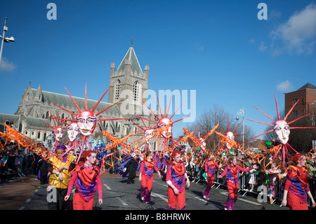 A group participates in the St Patricks Day Parade in Dublin Ireland Stock Photo