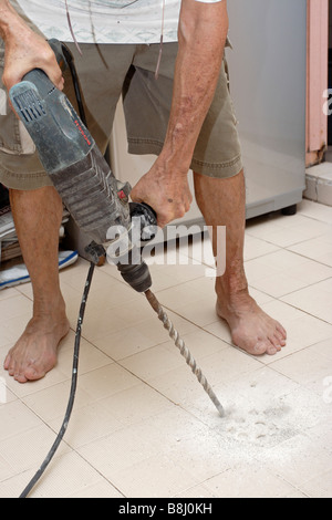 Using modern power tool. Stock Photo