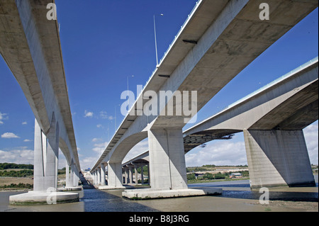 Estuary view of the three bridges that comprise the Medway Crossing. The slender High Speed 1 Eurostar bridge is on the left. Stock Photo