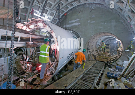 Contractors prepare to launch tunnel boring machine to excavate power cable tunnel under the River Thames in London. Stock Photo