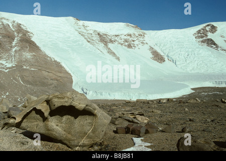 Ventifacts and glaciers in the scenic McMurdo Dry Valleys, Antarctica. Stock Photo