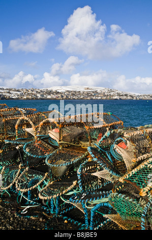 dh  STROMNESS ORKNEY Crab and lobster creels Hamnavoe harbour snow hills lobsterpots baskets Stock Photo